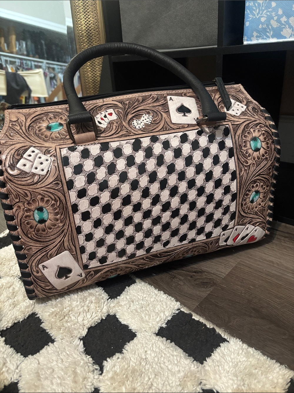 Black and Beige Patterned Travel Tote with Playing Card Motif 
Tooled leather